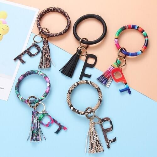 2020 New Fashion Women Jewelry Snake Leopard Print PU Leather Tassel Pendant Key-shape Bracelet Leather Keychain for Key Bangles