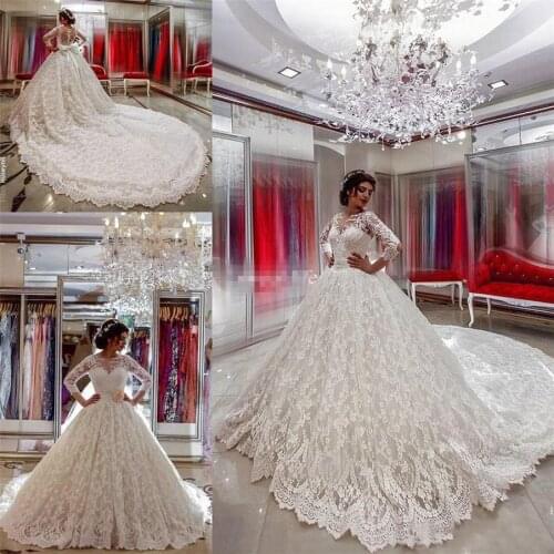 Arabic Country Western Bridal Gowns Chapel Train Covered Button Luxury New Vintage Long Sleeve Lace Wedding Dresses Ball Gown Bo