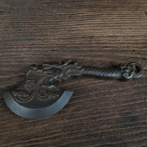 An old iron axe in the countryside, Exquisite iron horse handicraft ornaments