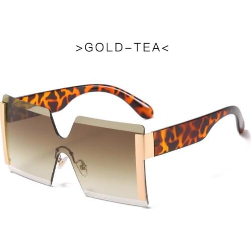 Fashion personality sunglasses frameless one-piece sunglasses female 2021 personality street shooting men women glasses UV400