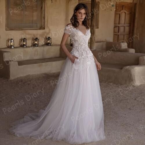 Beach Short Sleeve Wedding Gowns 2021 Charming Lace Appliques Beading Bride Dresses Sweep Train Bridal Dress Vestido De Noiva