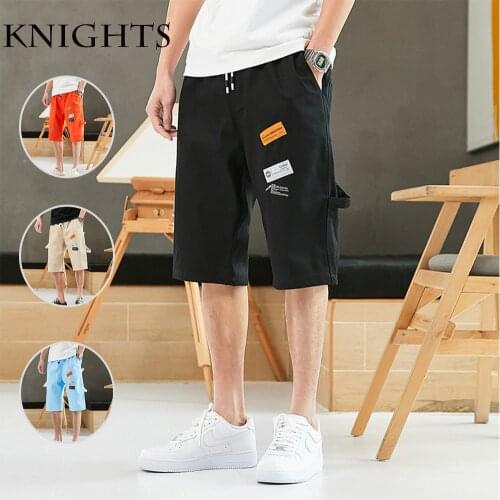 2021 Men Shorts Streetwear Pattern Jogger Shorts Women Men Summer Loose Elastic Waist Skateboard Shorts Knee Length Shorts 8Xl