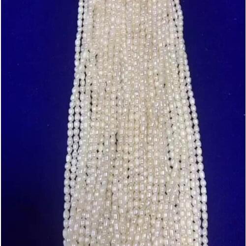 Cheap 9-10 mm rice shape fresh water pearl strands
