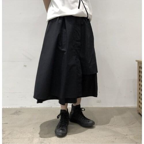 Large size design small crowd simple medium length skirt womens summer irregular stitching A-line high waist skirt