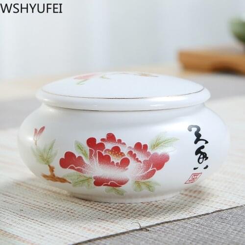 Mini ceramic tea cans small and half loaded portable Chinese medicine cream sealed cans Pu'er flower red tea packaging