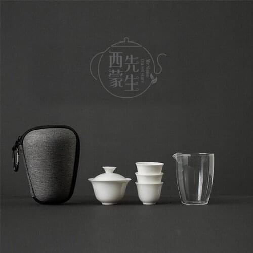 De Hua white porcelain covered bowl express Cup travel Tea Set portable outdoor travel tea set set Kung Fu household Set