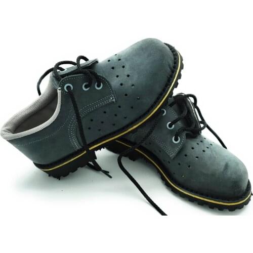 Waterproof safety shoes odor control external holes for breathability