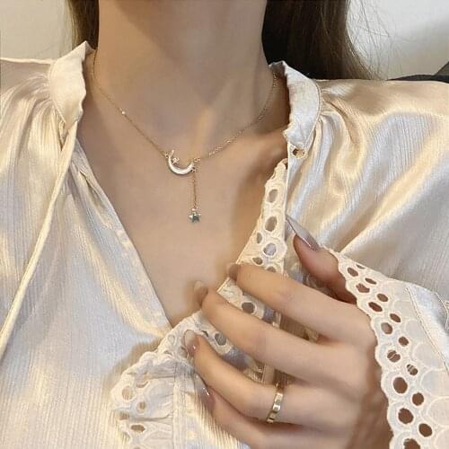 New product zircon star and moon pendant net red fashion titanium steel necklace female wild light luxury clavicle chain