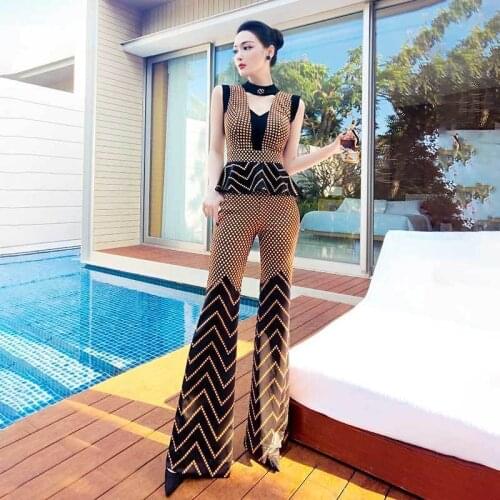 2021 age-reducing foreign gas womens summer 2021 new printed stitching temperament hanging neck top flared pants two-piece set