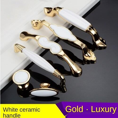 Golden and white ceramic handle American European wardrobe door handle Nordic cabinet drawer cabinet modern simple single hole