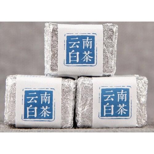 2020 Yunnan Mini Compressed Tea Sun dried Nectar Fragrance White Chinese Tea 100g