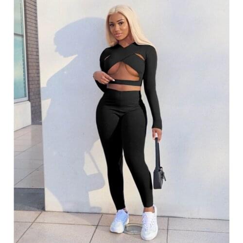 Ladies suit Ladies nightclub trousers 2-piece suit Solid color blouse hollow sexy cross sports two-piece suit