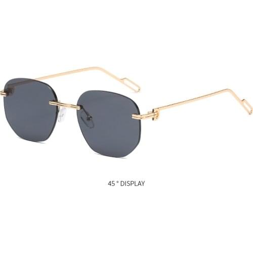 2021 new small frame trimmed rimless metal sunglasses women street fashion European and American trendy glasses