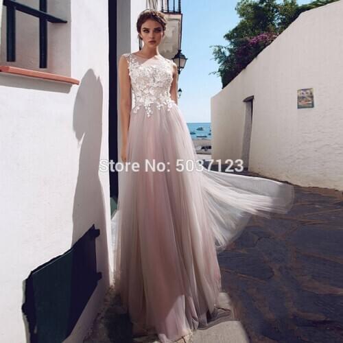Beach Wedding Dresses A-Line Flowers Tulle Lace Appliques Sleeveless O Neck Bridal Gown Floor Length Vestido De Noiva