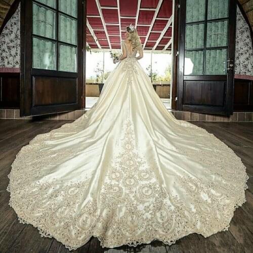 2020 Vintage Sheer Long Sleeves A-line Wedding Dresses Lace Appliques Beaded Bridal Gowns Long Garden Robe De Marriage Custom