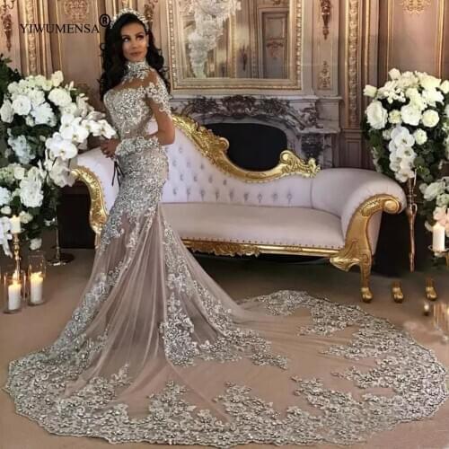 Dubai Arabic Luxury Sparkly Mermaid Wedding Dresses 2020 Bling Beaded Lace Applique High Neck Illusion Long Sleeves Bridal Gowns