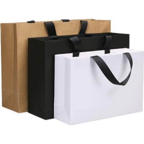 100pcs High quality Balck White kraft paper bag with handle wedding party bag Fashionable cloth shoes gift paper bags Wholesale