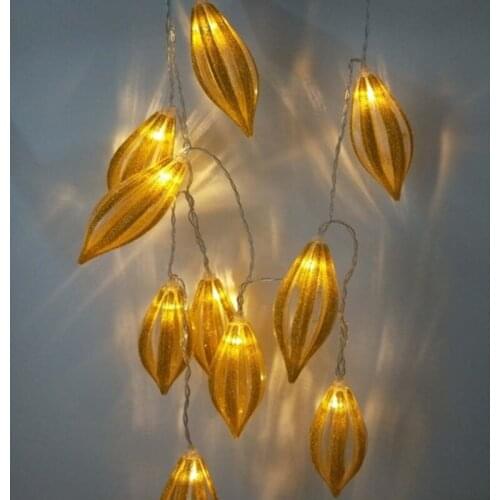 Golden Conical Lights Strung Together To Decorate The Scene Of Party And Festival Activities
