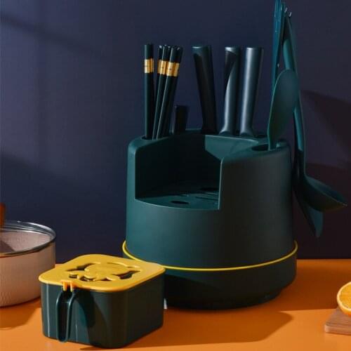 Creative kitchen rotary knife rest dripping chopsticks cage storage rack seasoning box knife chopsticks cage combined knife rest