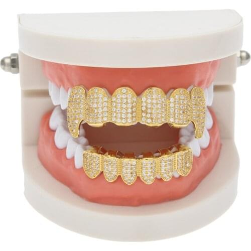 Iced Out Grillz TEETH Hip Hop AAA Zircon Fang Mouth Teeth Caps gold silver Color plating Top & Bottom Dental Grills Set