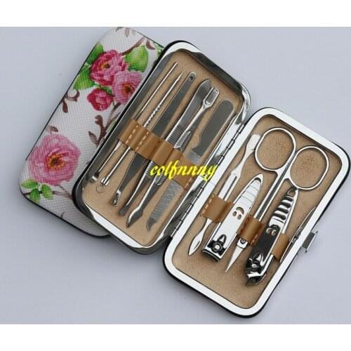 100sets/lot Fast shipping 10pcs/set Carbon steel Nail Clipper kit Nail Care Pedicure Scissor Tweezer Ear Pick Manicure Set