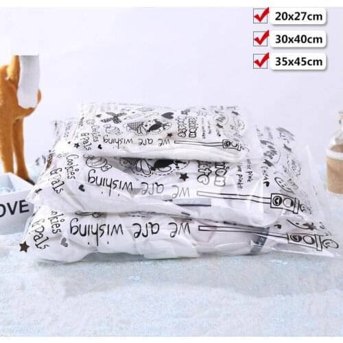 1000pcs/lot Cartoon clothing storage bag plastic bags Waterproof garment shoe luggage bag Clothing retail bag