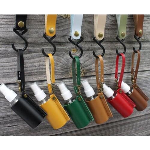 Portable 60ml Squeeze Spray Bottle Cover Empty Leakproof Plastic Refillable Travel Mister Bottle with Leather Keychain Holder