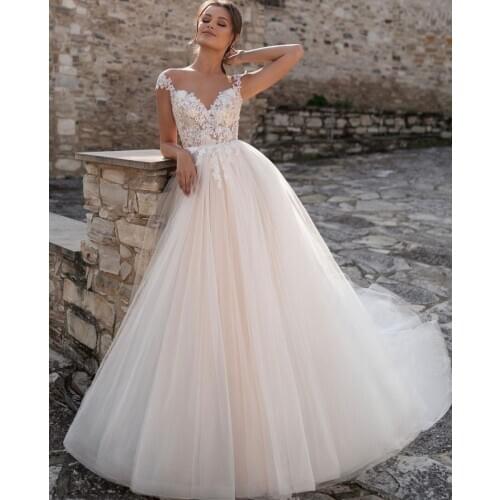 Wedding Dress A-Line V-Neck Cap Sleeve Lace Appliques Sequined Backless Floor Length Sweep Train Elegant Bride Gown 2021