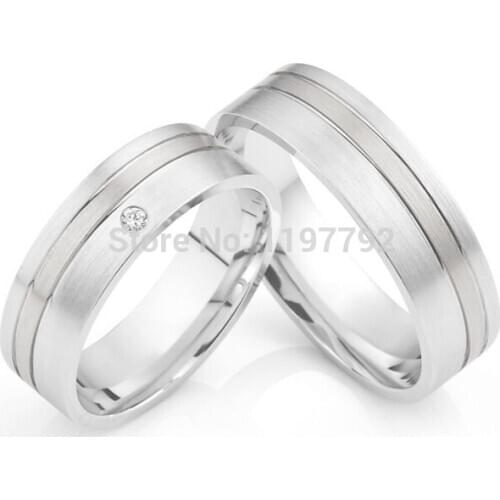 2014 custom tailor his and her titanium engagement ring sets for men and women titan trauringe