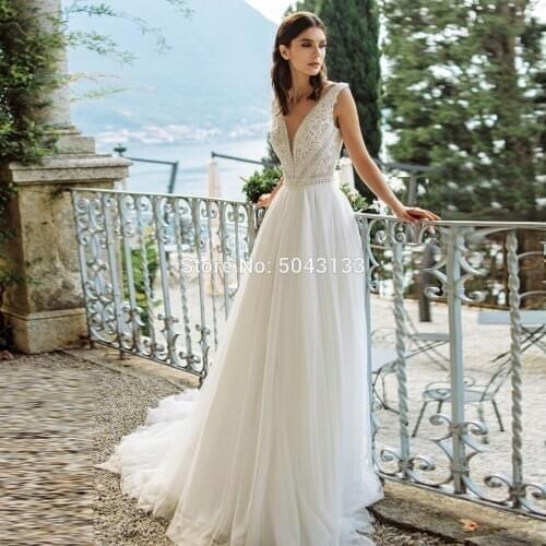 Tempting V Neckline Lace A Line Wedding Dresses with Appliques Open Back 2020 Tulle Boho Bridal Gowns Robe de Mariee with Bow