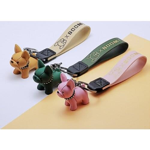 Fashion metal bronzing leather rope puppy French fighting dog keychain creative mobile phone backpack car pendant fun keychain