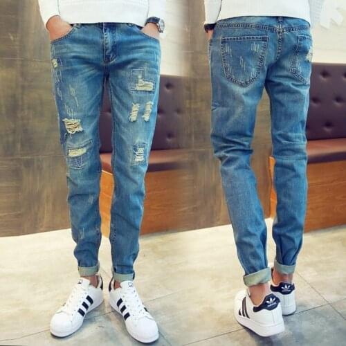 Hot 2021 South Koreas new ripped jeans boys Korean style slim casual pants feet straight trend trousers young mens trousers