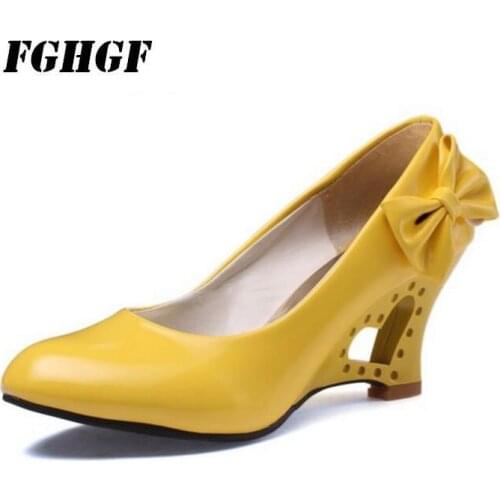 In the spring and autumn season Bow fashionable candy color patent leather shoes Hollowed-out wedge size womens shoes 34-43