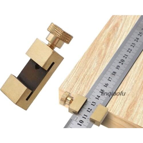 Wood ruler positioning block for steel ruler positioning block