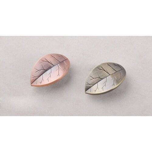 Dark purple bronze leaves little shake handshandle individuality creative wine cabinet drawer against the old handle