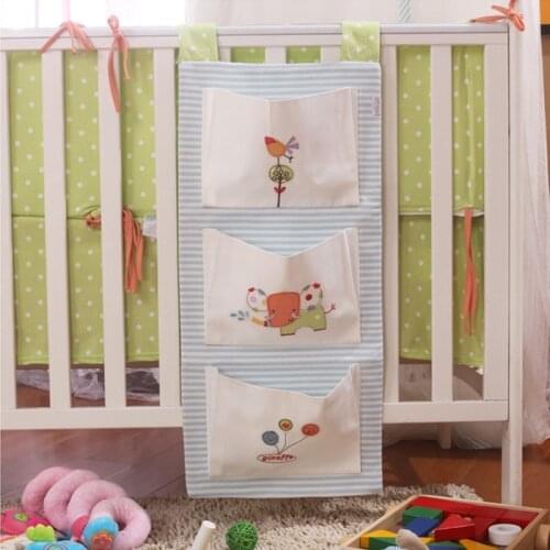 Crib Baby Bed bumper Hanging Storage Bag Multi-functional muslin Baby Cot pocket Hanging Storage Bag Baby Bedding Bumper 35*75cm