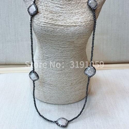 The necklace is a simple black long neck necklace with collar and neck necklace