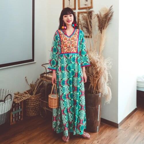 Film Bohemia national wind heavy embroidery stitching v-neck printed on holiday dress three color restoring ancient ways