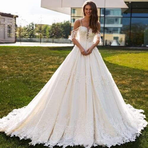 Sexy Backless Sweetheart Lace Princess Wedding Dresses 2020 Appliques Beaded Half Sleeve Vintage A Line Bridal Gowns