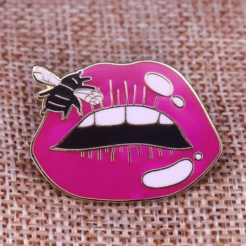 Female wearing red lipstick with a bee on her lips Pin