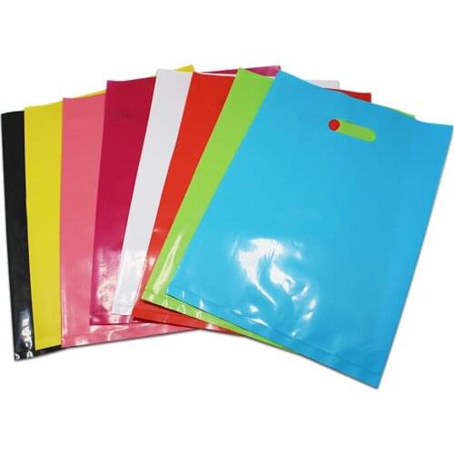 50Pcs Colorful Plastic Grocery Packaging Bag Market Clothes Shopping Bags Party Event Gift Boutique Storage Pouch with Hang Hole