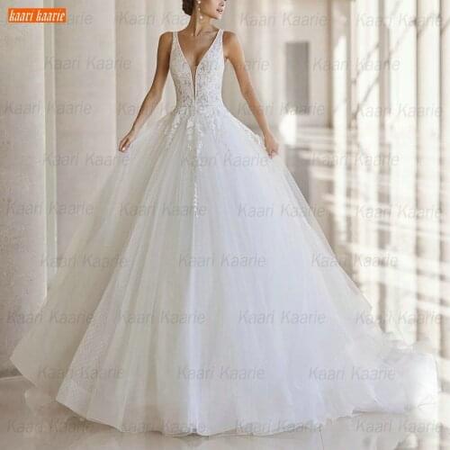 Luxury White Wedding Dress 2021 Vestido De Casamento Backless Lace Appliqued Tulle Ball Gown Robe De Mariée V Neck Bridal Gowns