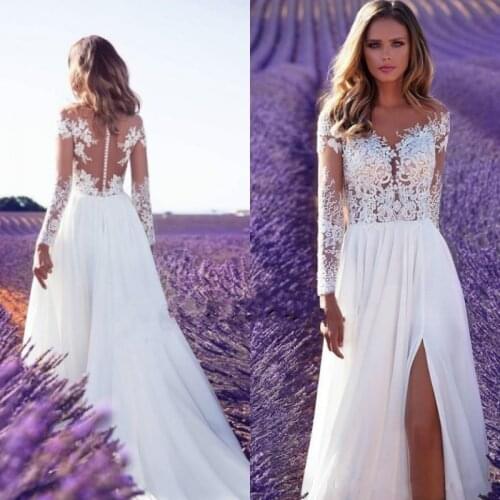 2021 New Cheap Bohemian Lace Wedding Dresses Beach Sheer Neck Appliques Wedding Dress Long Sleeves Backless Bridal Gowns Robe De
