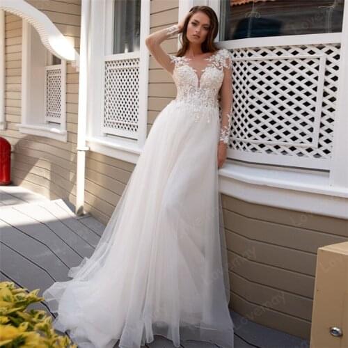 Lace Beach Wedding Dresses 2021 Beaded Sheer Neck Lace Appliques Button Illusion Long Sleeves Boho Bridal Gown Robe De Mariée