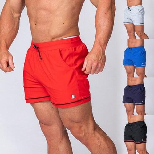 2021 New Fitness Essential Shorts Mens Leisure Sports Fitness Pants Basketball Game Training Running Loose Beach Pants