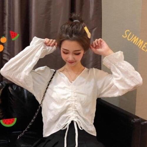2021 new womens drawstring lace up sexy V-neck trumpet sleeve long sleeve shirt white light ripe top