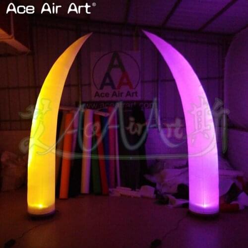 Factory price white fabric led ligthing decoration inflatable pillar,tusk with base and fan for wedding or stage entryway