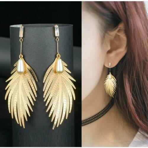New Fashion Jewelry Personality Metal Leaf Pearl Earrings Long Paragraph Female Statement Earrings Bohemian Crystal Earrings