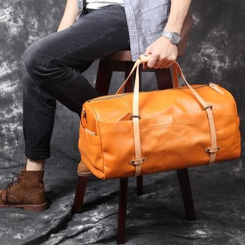 Mens retro simple genuine leather travel bag new first layer cowhide large capacity daily duffel bag business travel handbag