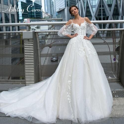 Ashley Carol A-Line Wedding Dress 2021 Spaghetti Straps Beaded Appliques Backless Bride Dresses Shining Princess Bridal Gown